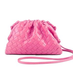Pink leather woven clutch bag